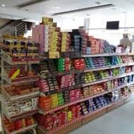 Packaged namkeen shelf — Dharti Namkeen & Sweets